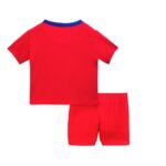 Kids PSG third football kit 2025/26 with red jersey and shorts.
