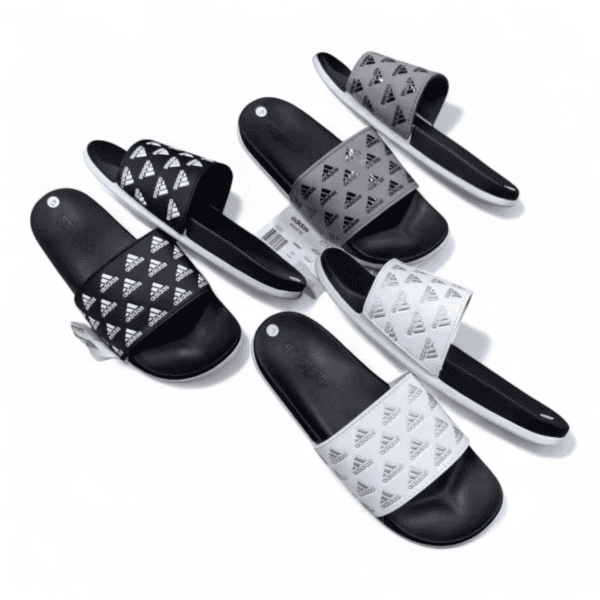 Comfortable Adidas monogram slides for casual wear.