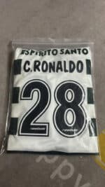 Kids Sporting Lisbon Ronaldo 28 jersey, authentic football kit for children.