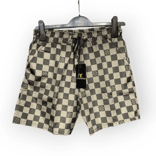 Louis Vuitton Damier beige swim shorts with drawstring, stylish and comfortable for beachwear.