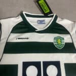 Kids Sporting Lisbon home football jersey with Ronaldo 28, authentic design, green and white stripes.