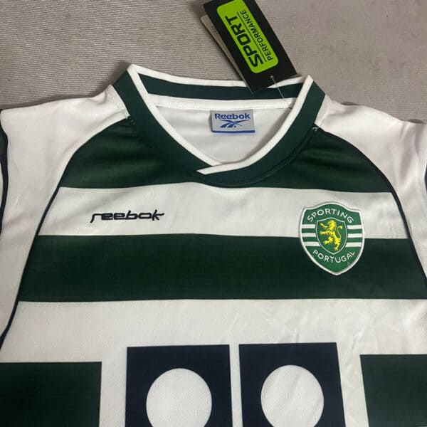 Kids Sporting Lisbon home football jersey with Ronaldo 28, authentic design, green and white stripes.