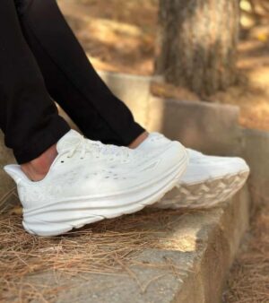White HOKA Clifton 8 running shoes for men and women.