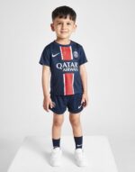 Kids PSG home football kit 2024/25 with team logo and sponsor.