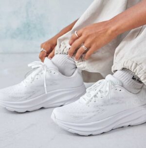 White HOKA Clifton 8 running shoes for men and women.