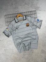 Official FC Barcelona 2023 home football jersey with Ronaldinho 10, authentic match-worn kit.