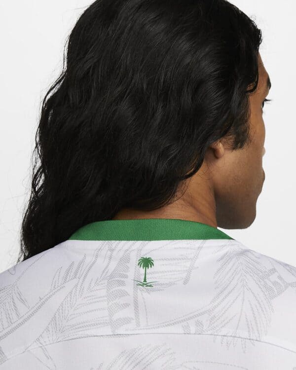 Football jersey with palm tree graphic, stylish sportswear for fans.