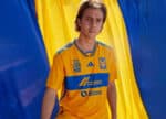 Official Tigres UANL 2023/24 home football jersey, vibrant yellow with blue accents.