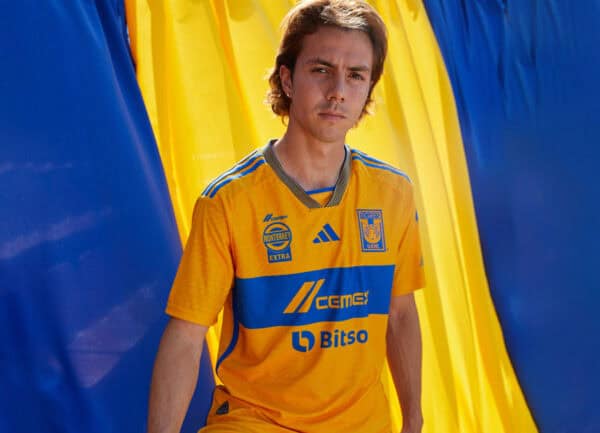 Official Tigres UANL 2023/24 home football jersey, vibrant yellow with blue accents.