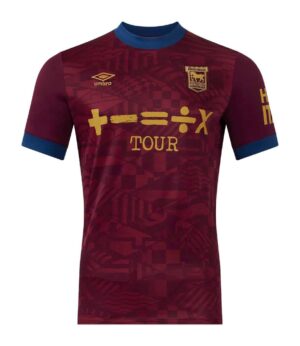 Ipswich Town away football jersey 2024/25, maroon with blue accents, featuring club crest and sponso.