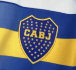 Close-up of a blue and yellow striped fabric with an embroidered shield patch reading CABJ, likely a sports team insignia.