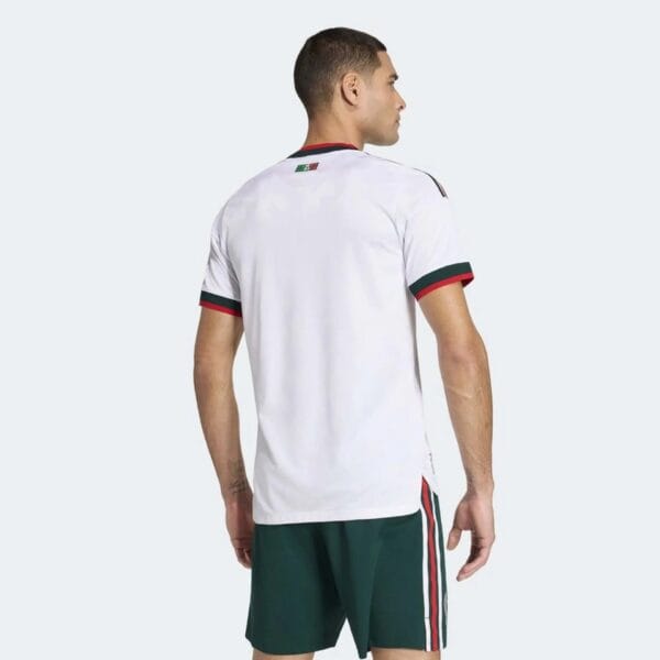 Mexico away football jersey for World Cup 2026, white with red and green accents.
