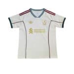 White Liverpool FC football jersey with Standard Chartered sponsor, Adidas logo, and club crest, featuring burgundy and teal trim.