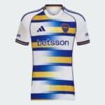 White Boca Juniors football jersey with blue and yellow horizontal stripes and club crest on the chest, sponsor text visible.