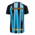 Gremio football home jersey 2026 with blue, black, and white vertical stripes, featuring sponsor log.