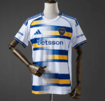 White Boca Juniors soccer jersey on a dress form with blue and yellow horizontal stripes and Betsson sponsor logo.