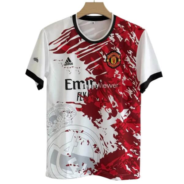 Manchester United home jersey on a hanger with red abstract pattern, club crest, Adidas logo, and Emirates sponsor text.