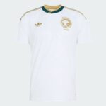 White Saudi national football jersey with gold accents, Adidas logo, and SAFF crest on the chest