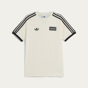 Cream-colored T-shirt with black double stripes along the sleeves and an 'Oasis' patch on the chest.