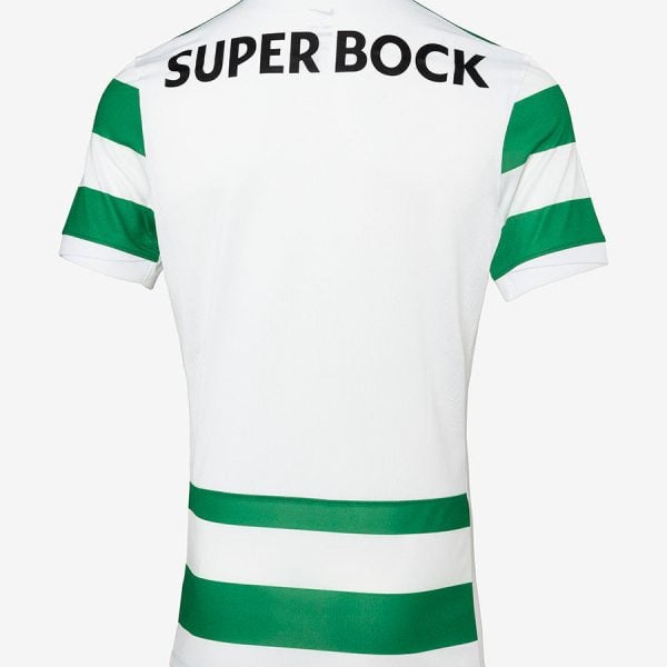 Back view of a white soccer jersey with two green horizontal bands near the lower torso and 'SUPER BOCK' text across the upper back.
