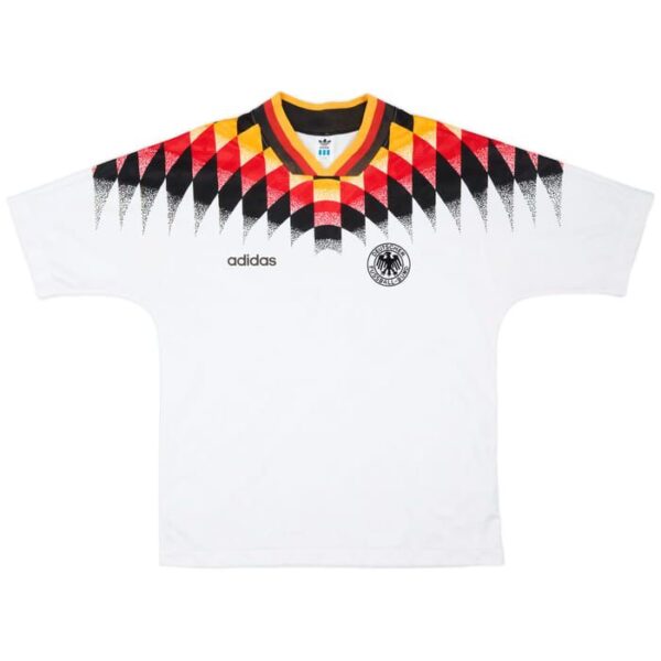 White Adidas Germany soccer jersey featuring a black‑red‑yellow diamond pattern across the shoulders and the federation crest on the chest left side.