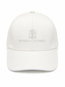 White baseball cap with subtle Brunello Cucinelli logo embroidered in gray on the front panel