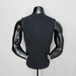 Back view of a glossy black mannequin torso wearing a sleeveless dark top, mounted on a stand.