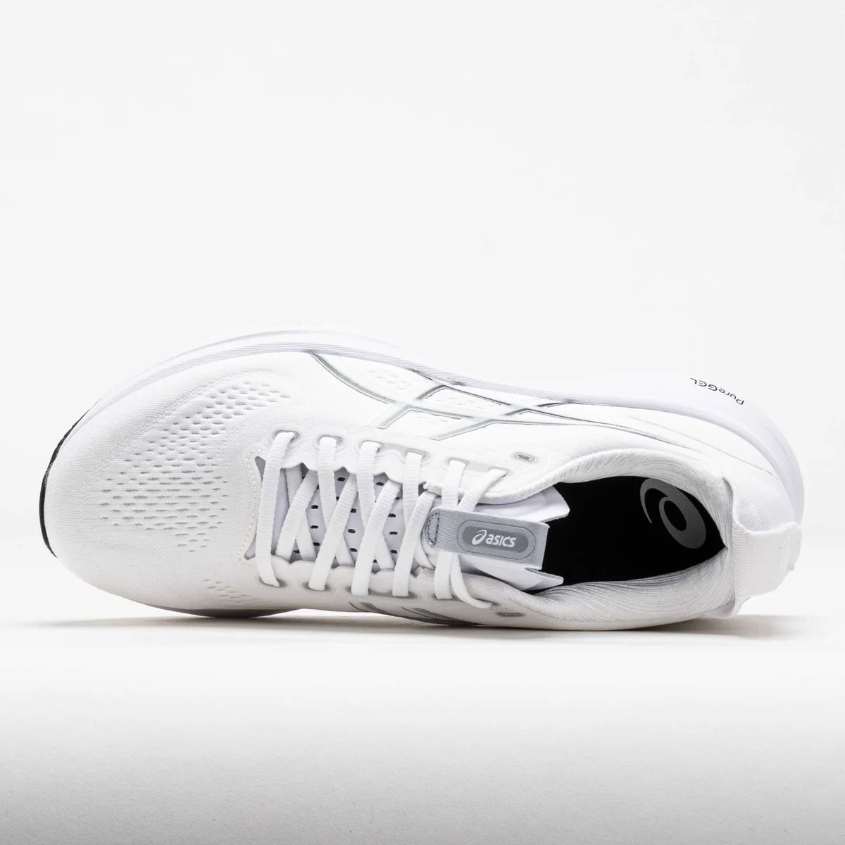 043162_2 | UAE SPORT STORE White Asics running shoe shown from the side on a white background, highlighting the perforated toe area and laced closure.