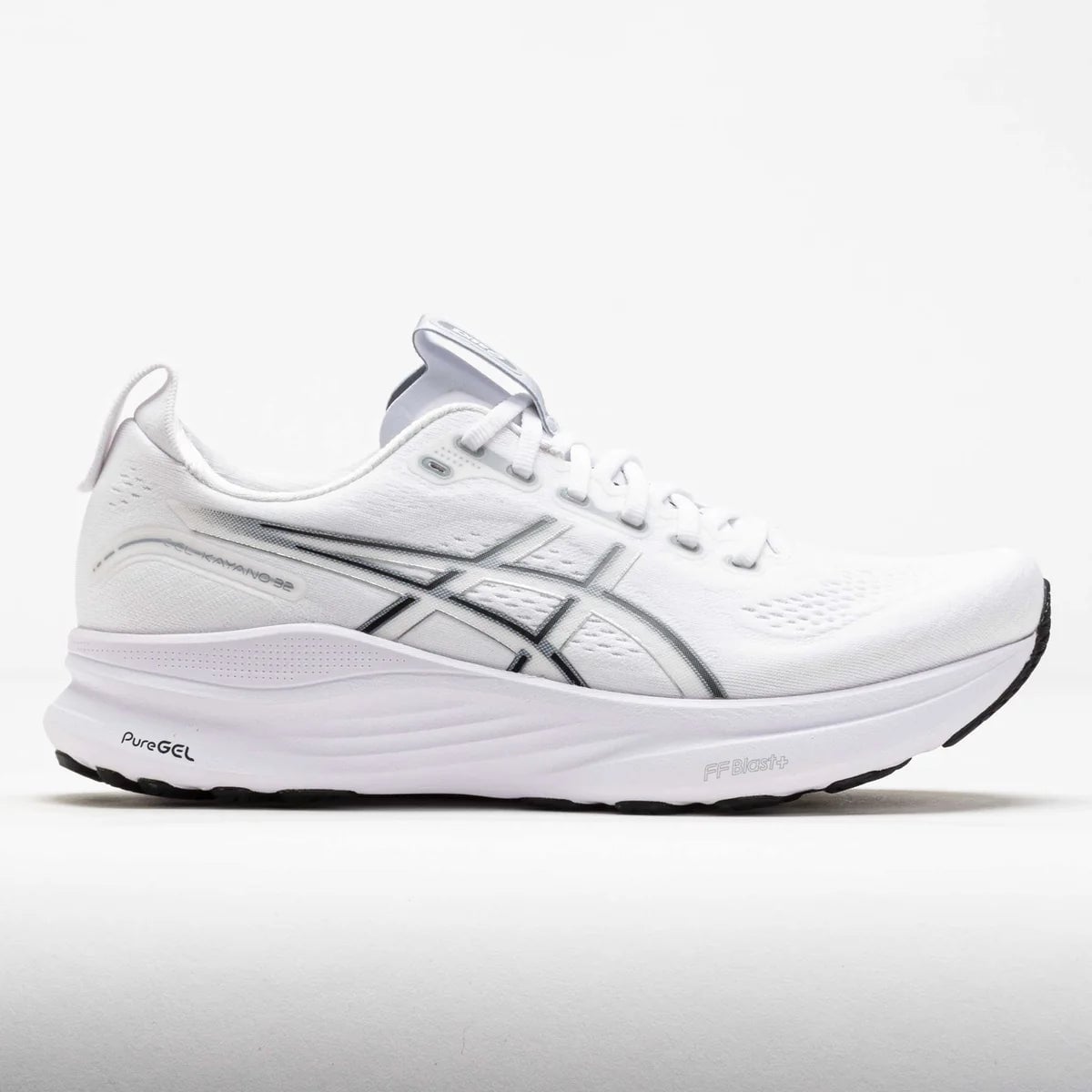 043162_3 | UAE SPORT STORE Side view of a white athletic running shoe with a thick cushioned midsole and subtle gray accents