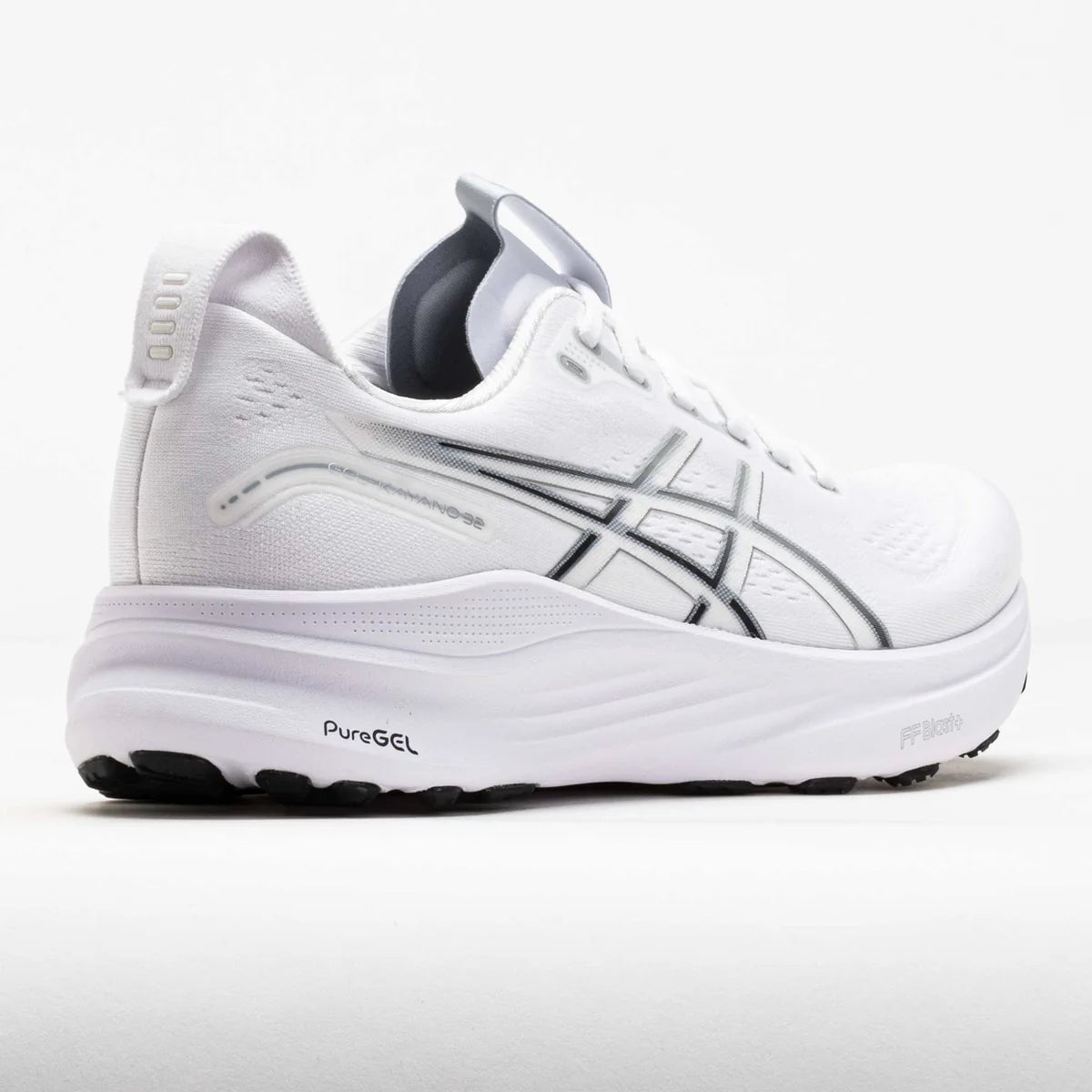 043162_6 | UAE SPORT STORE White ASICS running shoe shown in side view, with black logo stripes and a PureGEL label on the midsole.