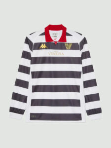 Long-sleeve rugby shirt with bold black and white horizontal stripes, red collar, gold Venezia branding on chest, and Kappa logo.