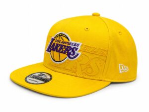 Yellow Los Angeles Lakers baseball cap with a purple Lakers logo embroidered on the front and an adjustable strap. (New Era 9FORTY) Readily identifiable team merchandise.
