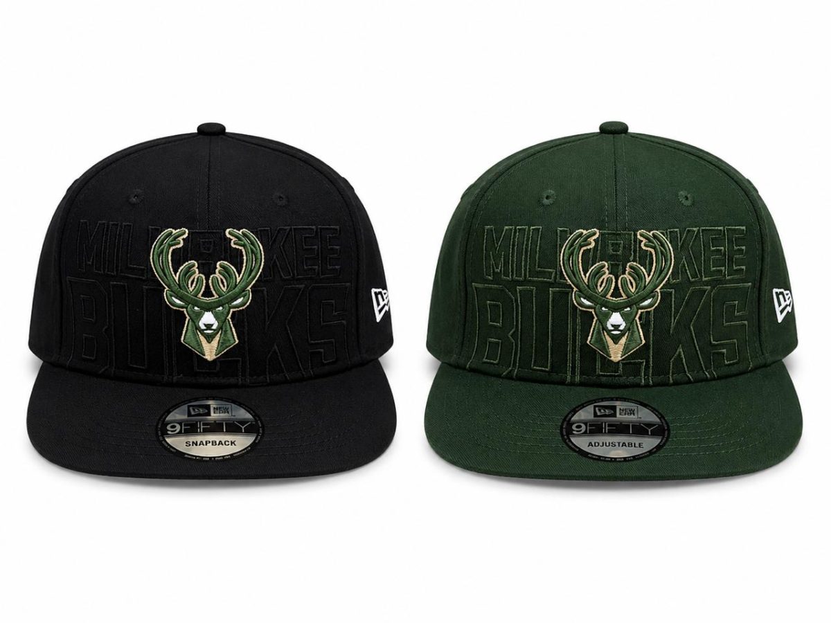 Two Milwaukee Bucks snapback hats, black and dark green, each with an embroidered deer logo and 'BUCKS' lettering on the crown.