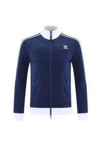 Navy blue Adidas track jacket with white collar and cuffs, full-zip front and white shoulder stripes, logo on the left chest