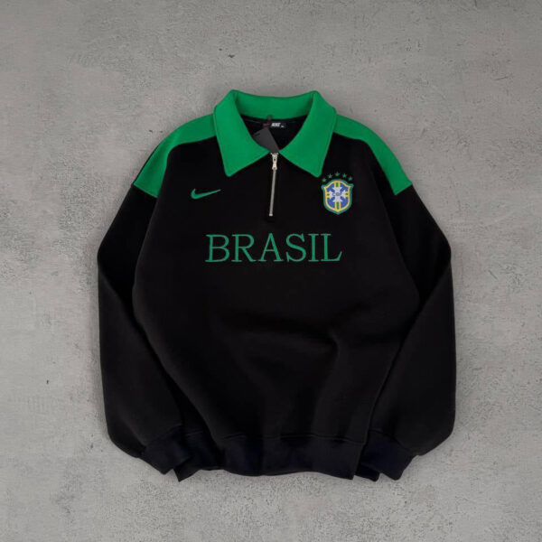 Black pullover sweatshirt with green collar and shoulders, BRASIL text across the chest and a Brazil crest on the left, plus a small Nike swoosh.