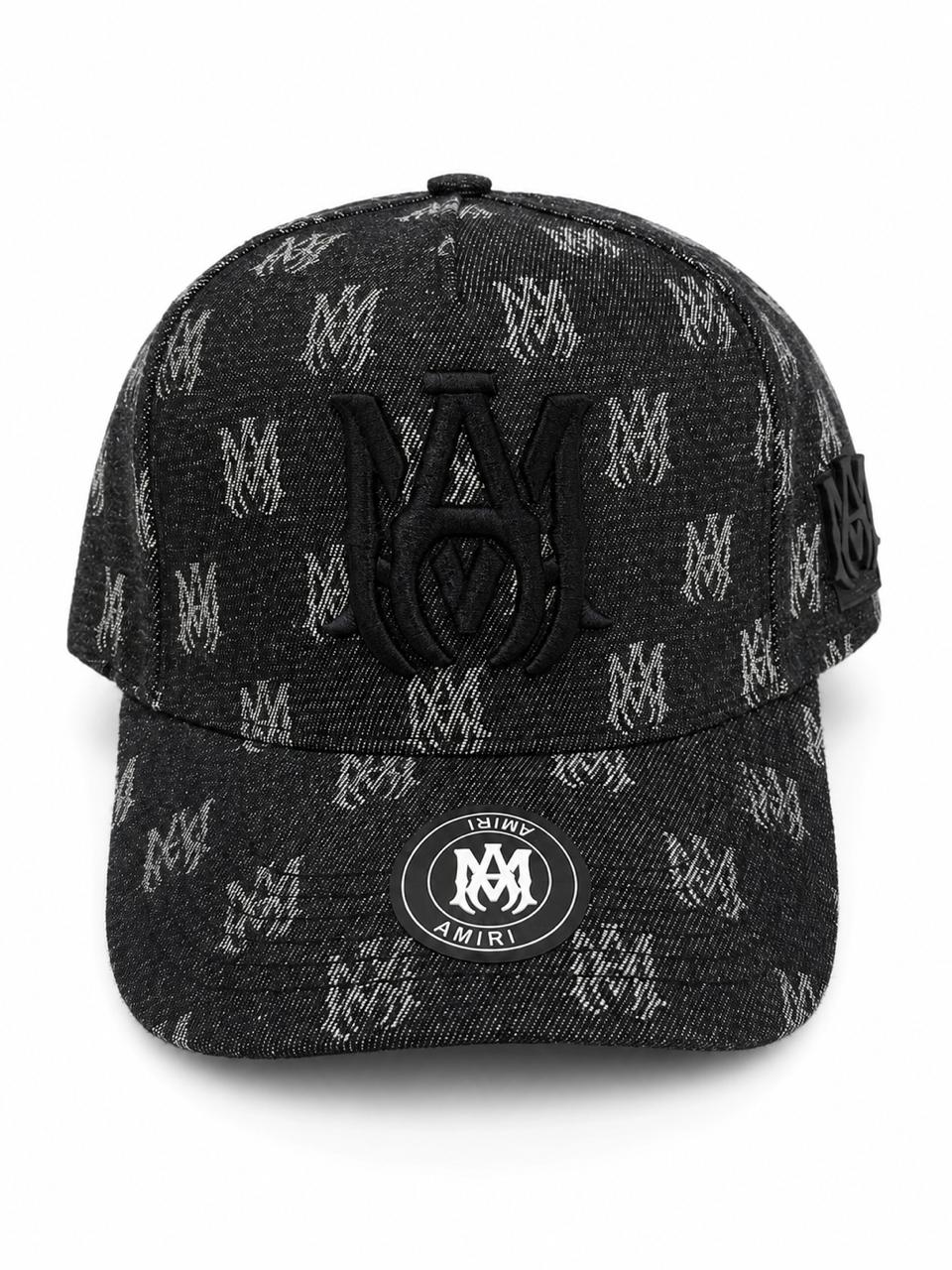 08d19d52-1f12-4c1b-99df-d639c67c05be Black baseball cap with an all-over gray AMIRI monogram pattern and a large black embroidered logo on the front; curved brim and side strap detail with AMIRI badge on the brim