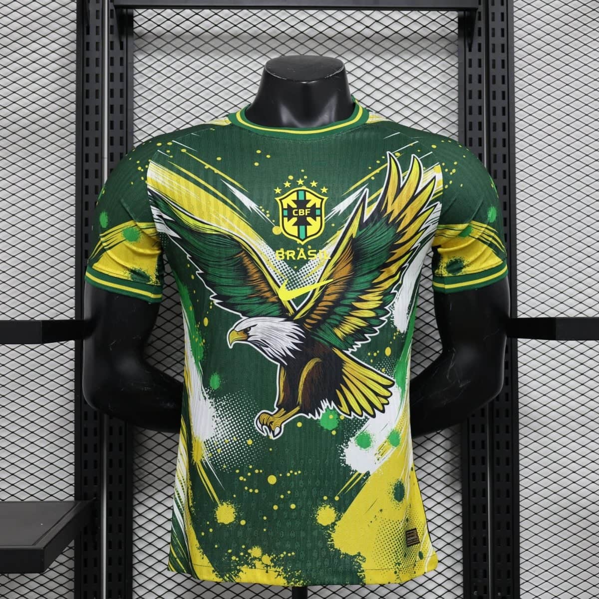 Brazil national team jersey on a black mannequin in a retail display, green and yellow artwork with crest and 'BRASIL' text visible.