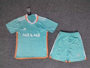 Miami FC teal jersey and shorts set with orange trim, Adidas logo, and Miami crest visible on chest and shorts.