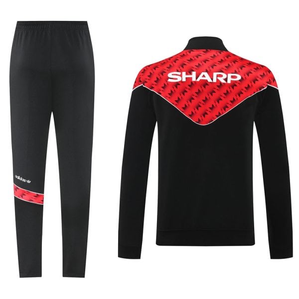 Black training tracksuit: jacket with a red zigzag pattern across the back and the SHARP logo, paired with black pants that have a red band and Adidas logo.