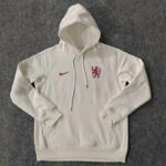 White hooded sweatshirt with a burgundy Nike swoosh on the left chest and a purple lion crest on the right chest.