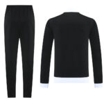 Black athleisure tracksuit set: elastic-waist pants and a long-sleeve top with white cuffs and hem (front and back shown)