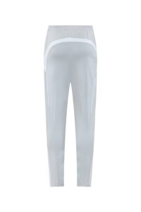 Back view of light gray athletic pants with white curved panels along the hips and sides, on a white background.