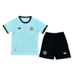 Light blue soccer jersey with black trim and team crest on the chest, paired with black shorts bearing the crest and a blue Adidas logo.