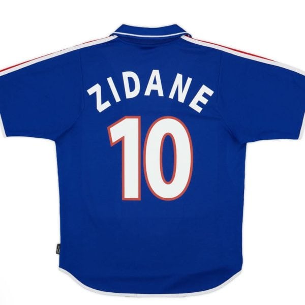 Back view of a blue sports jersey with white trim and a large white number 10 outlined in red on the back.