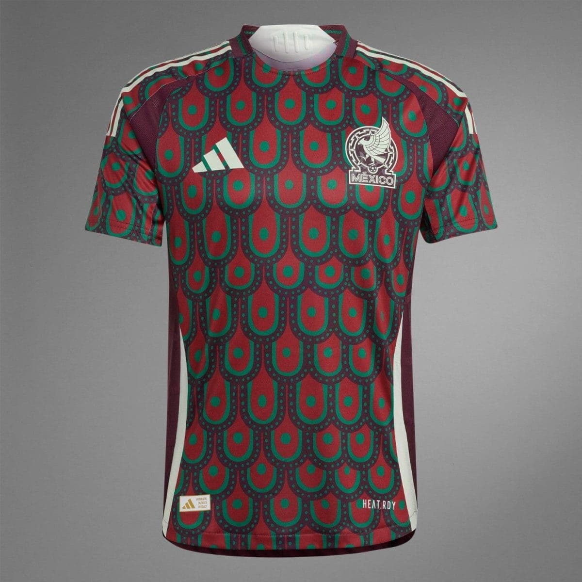 Maroon and teal patterned Mexico national team jersey with Adidas logo and crest on the chest.