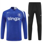 Chelsea FC blue training jersey with BingX sponsor and a white stripe detail, shown with matching black pants