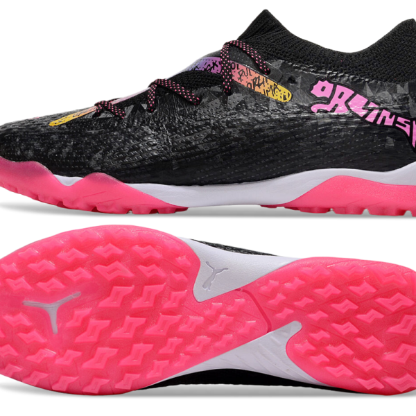 Black athletic shoe with a pink outsole and graffiti-style pink accents on a textured upper, side view.