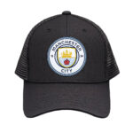 Black trucker cap featuring a Manchester City crest on the front panel.