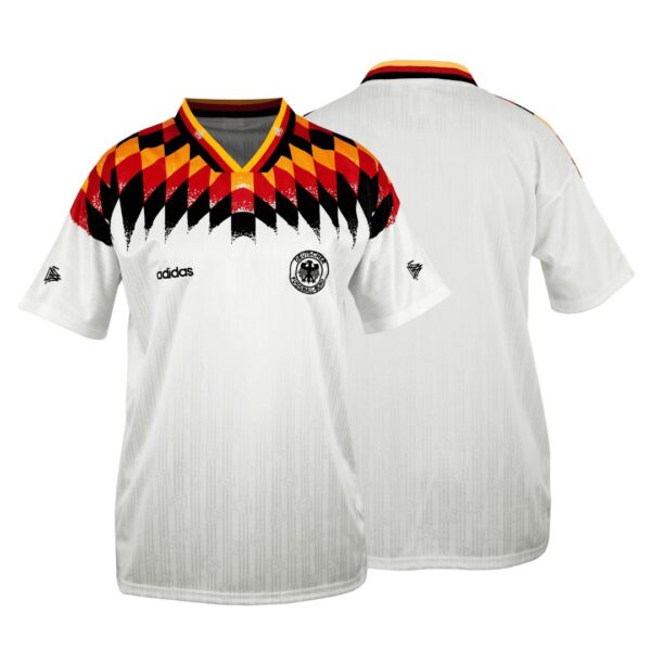 Front and back views of a white Germany national football jersey with a bold red, black and gold diamond pattern across the chest and crest on the front.