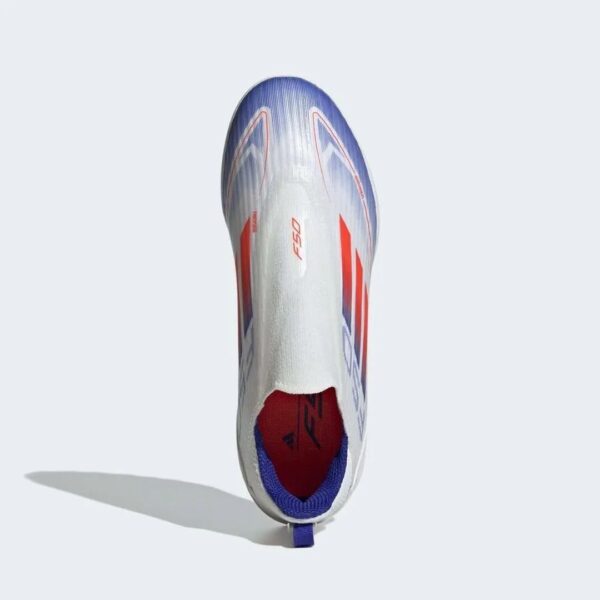 White athletic shoe with blue and red accents, viewed from the front with a heel pull-tab visible.